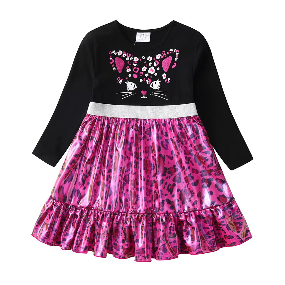 Black dress with pink cat face design and pink leopard print skirt on a white background