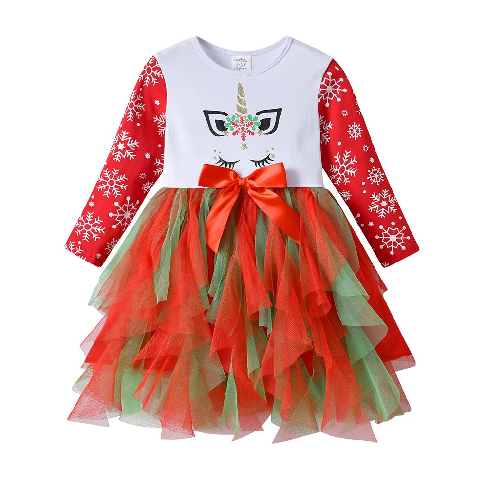 Children's dress with unicorn design and red and green colors on a white background