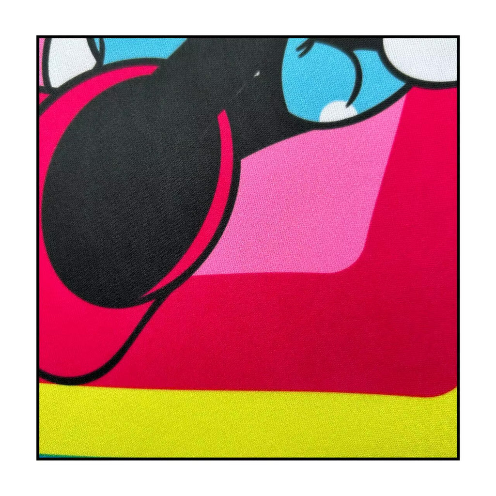 Colorful abstract design with pink, black, blue, and yellow on a white background