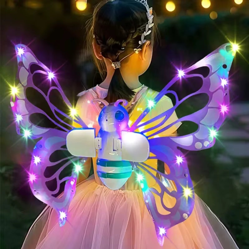 Child wearing a butterfly costume with LED lights against a dark background