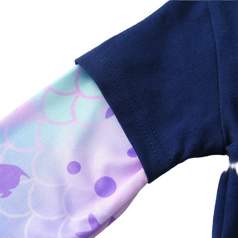Close-up of a blue garment with a patterned fabric inside on a white background