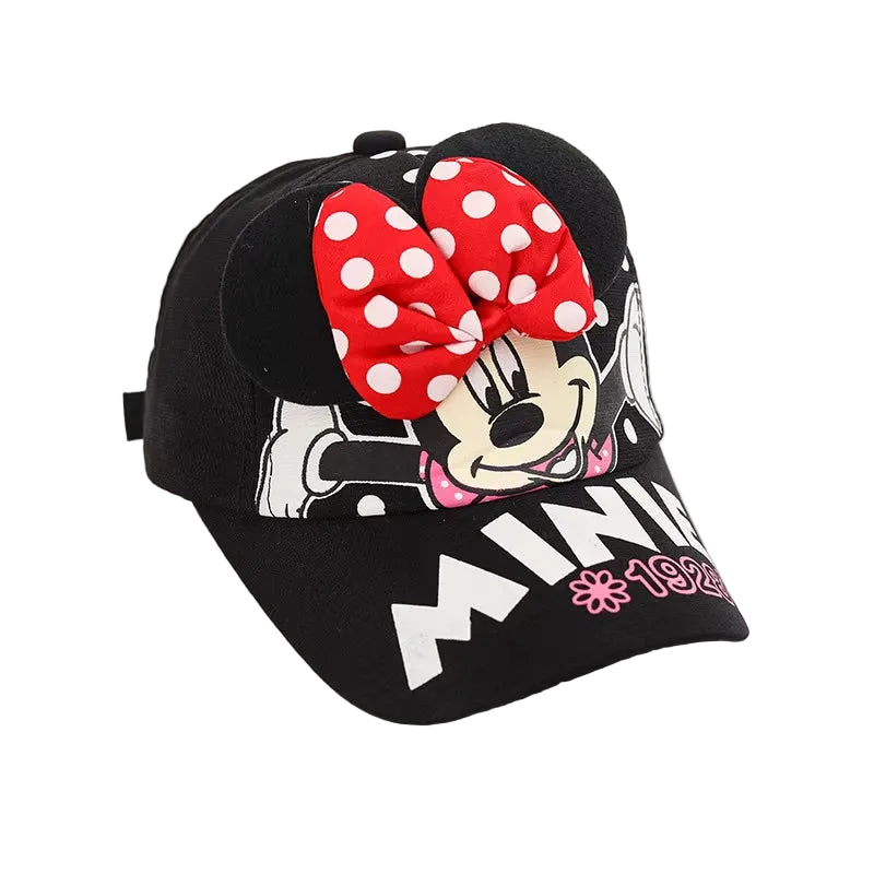 Black cap with Minnie Mouse design featuring a red bow on a gray background
