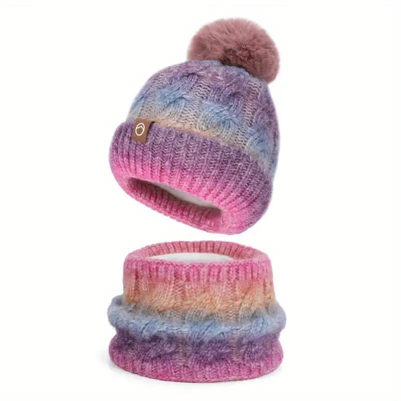Colorful knit hat and matching scarf set on a white background