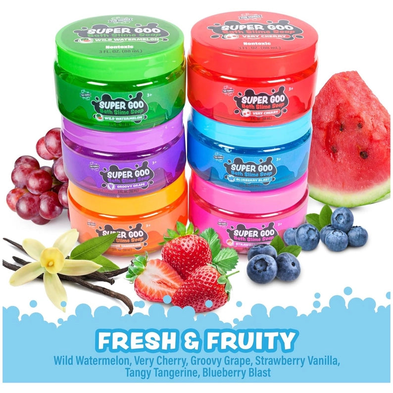 Colorful containers of Super Goo with fruit and floral elements on a white background