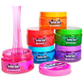 Colorful containers of Super Goo bath slime with a pink spoon on a white background