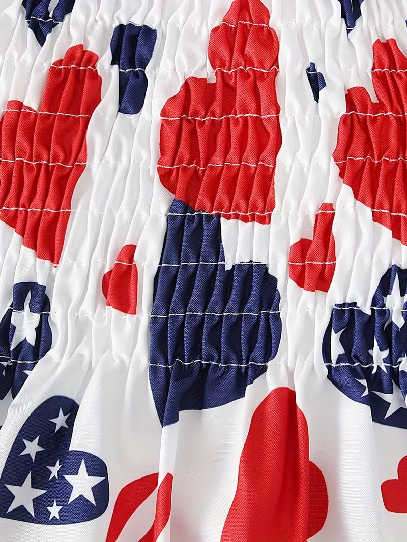 Curtain with red, white, and blue heart patterns
