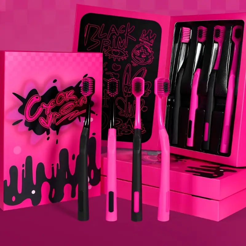 Pink and black toothbrushes with packaging on a pink background
