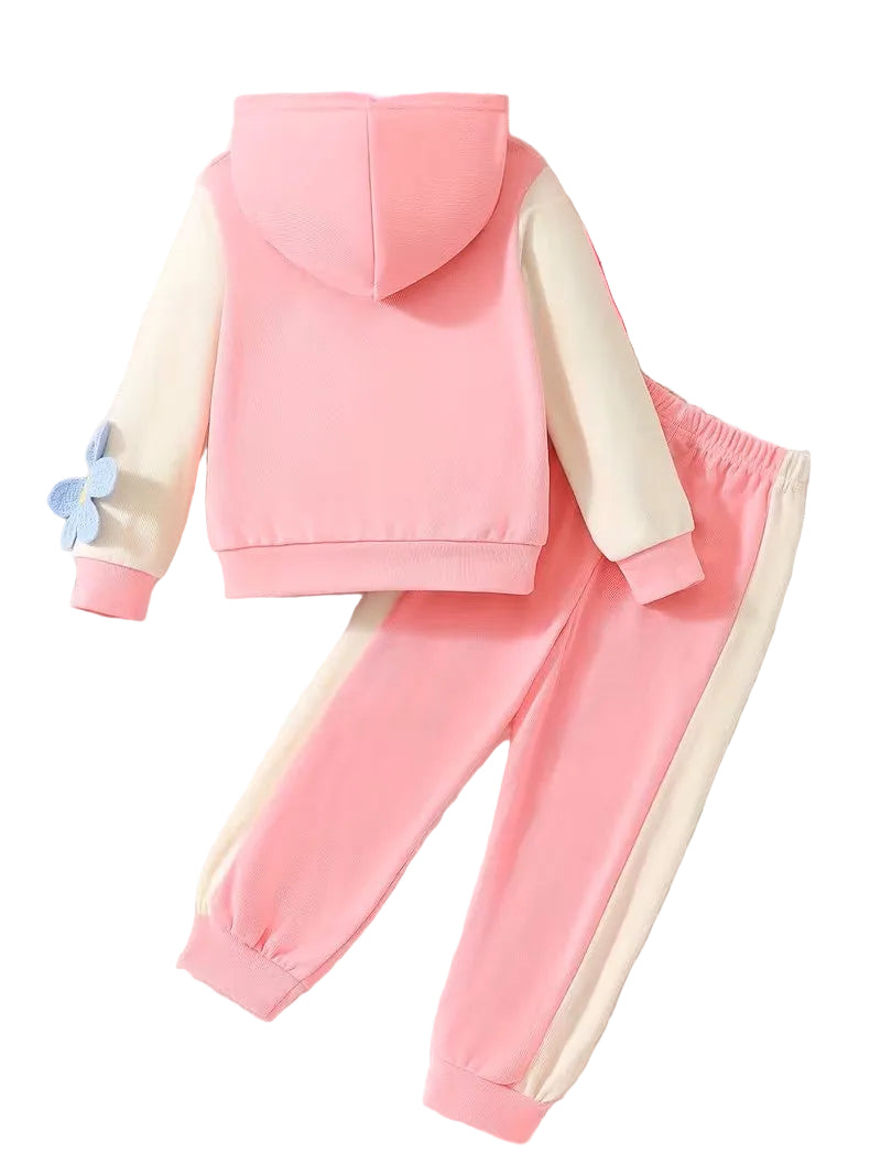 Pink and beige children's hoodie and pants set on a white background