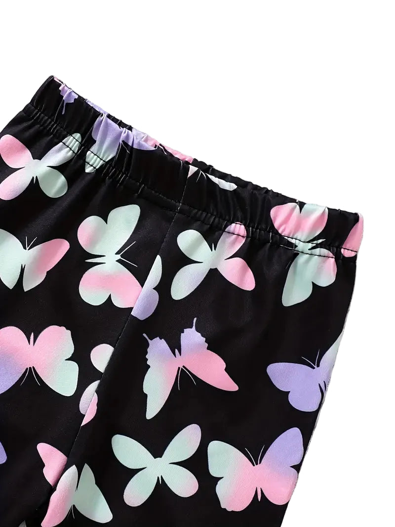 Black shorts with colorful butterfly pattern on a white background