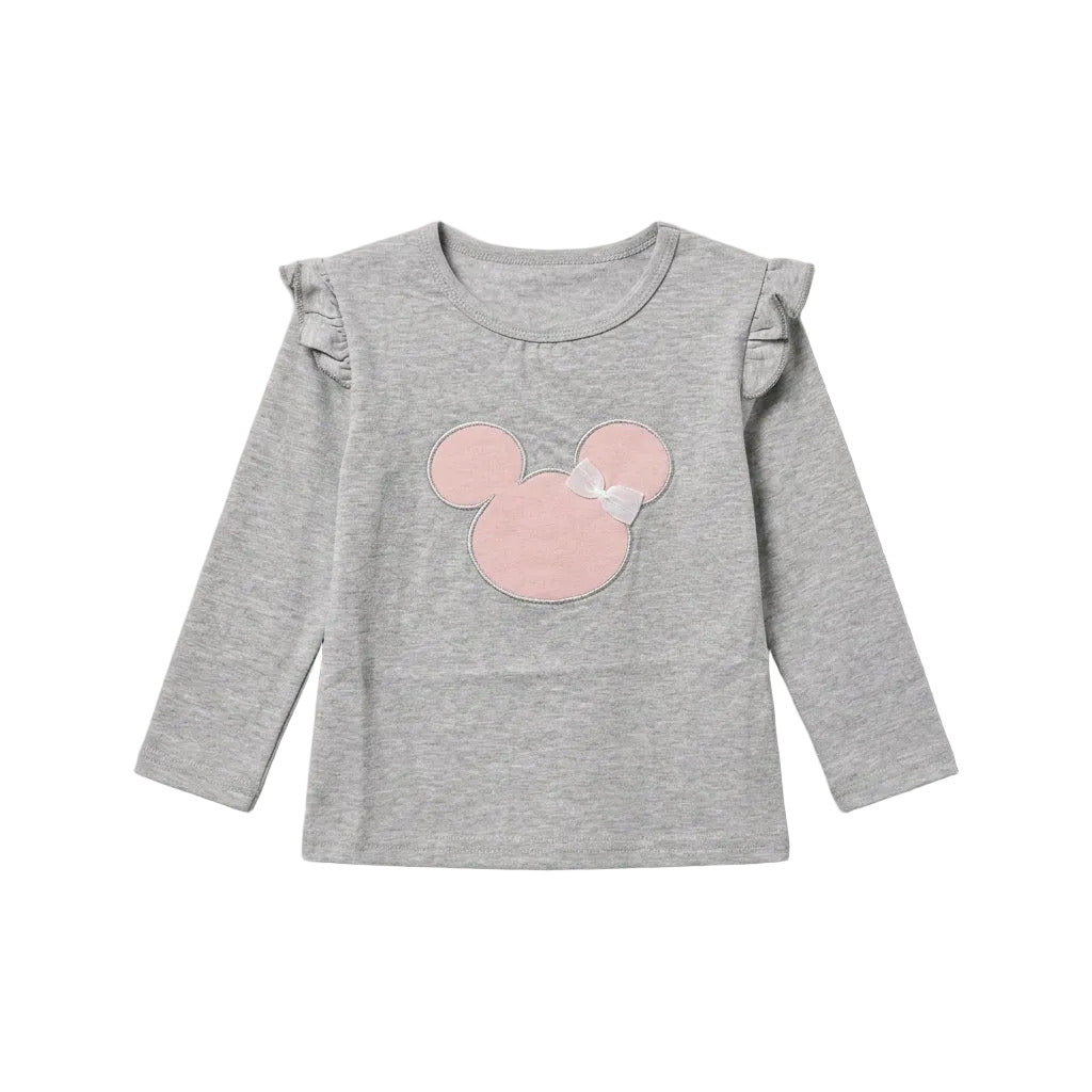 A toddler girl's long-sleeve heather gray top featuring a pink applique mouse head design on the chest and ruffled details on the shoulders, shown against a light gray background.