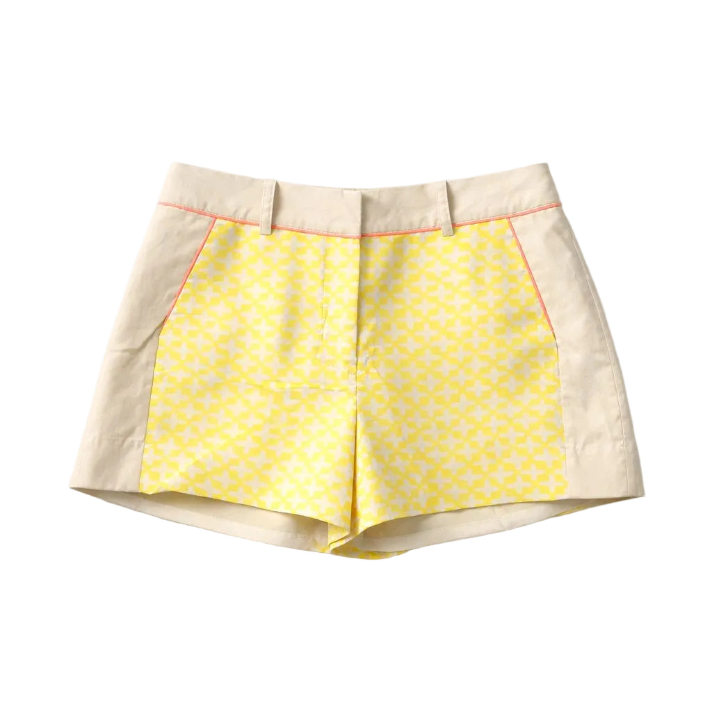 Skirt with yellow patterned front and beige back on a white background