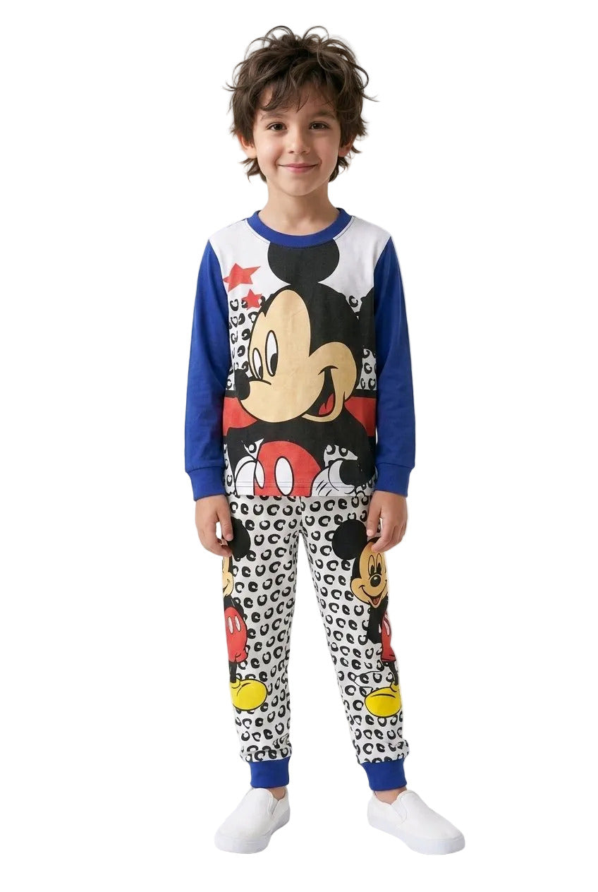Child wearing a colorful pajama set with cartoon character design on a white background