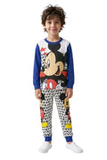 Child wearing a colorful pajama set with cartoon character design on a white background
