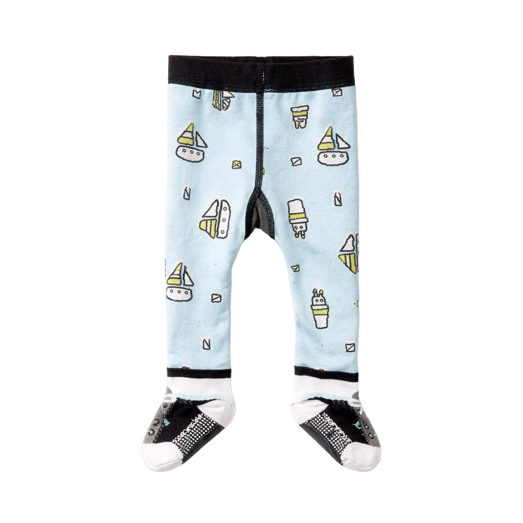 Children's leggings with sailboat pattern on a light blue background