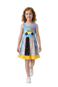 Young girl wearing a colorful dress with a yellow car design on a white background