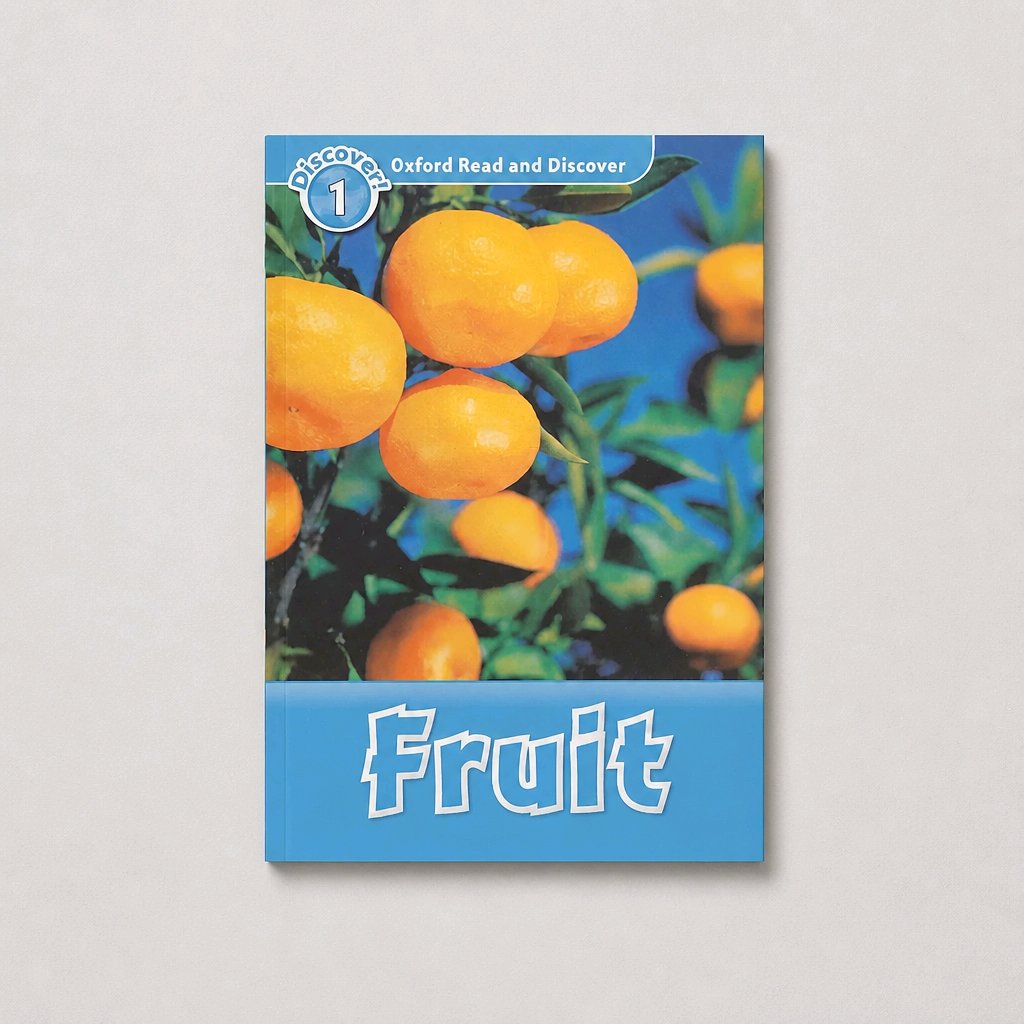 A children's educational book titled 'Fruit' from the 'Oxford Read and Discover' series, featuring a cover illustration of kumquats on a tree against a blue sky, displayed on a neutral light gray background.