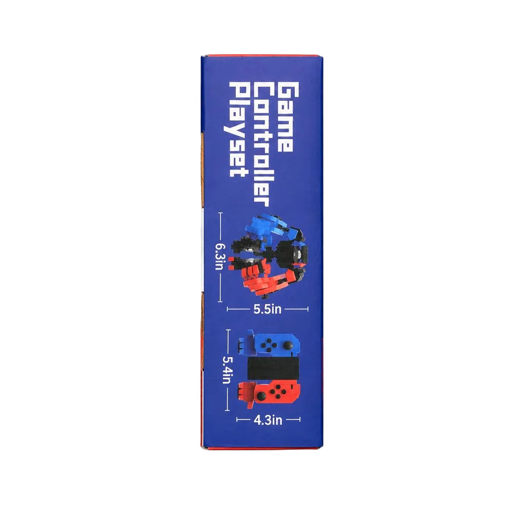 A tall blue product box for a 'Game Controller Playset' featuring illustrations of two toy game controllers with printed dimensions, photographed on a neutral light gray background.