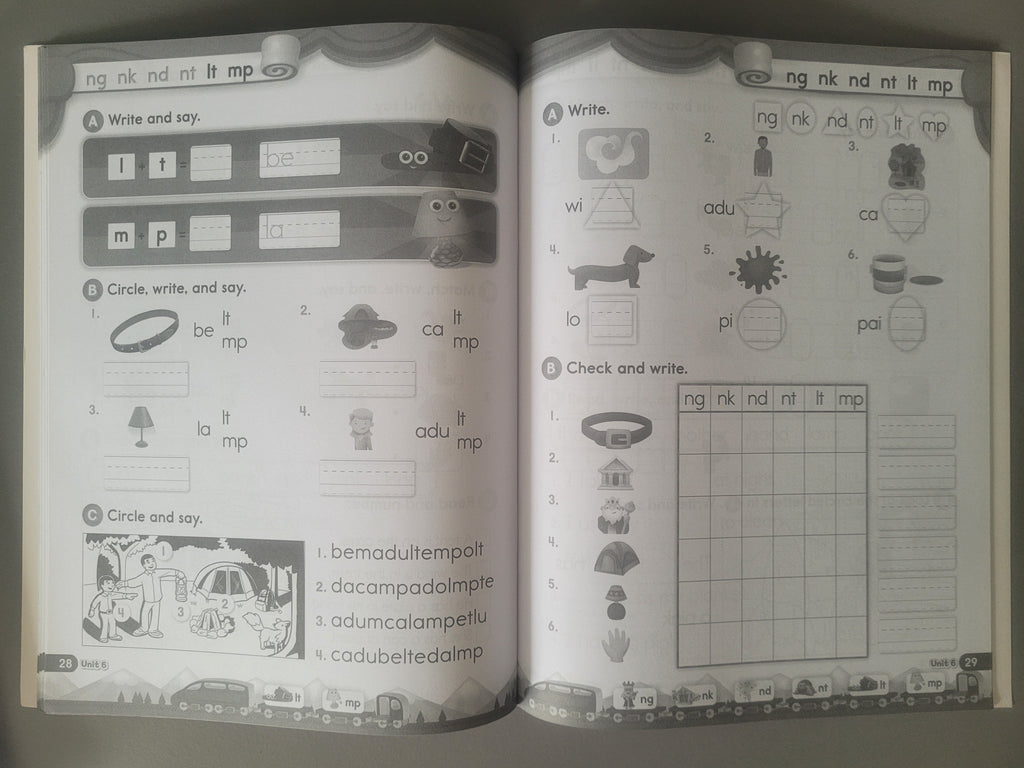Open book with educational content on phonics and vocabulary, featuring illustrations and text.