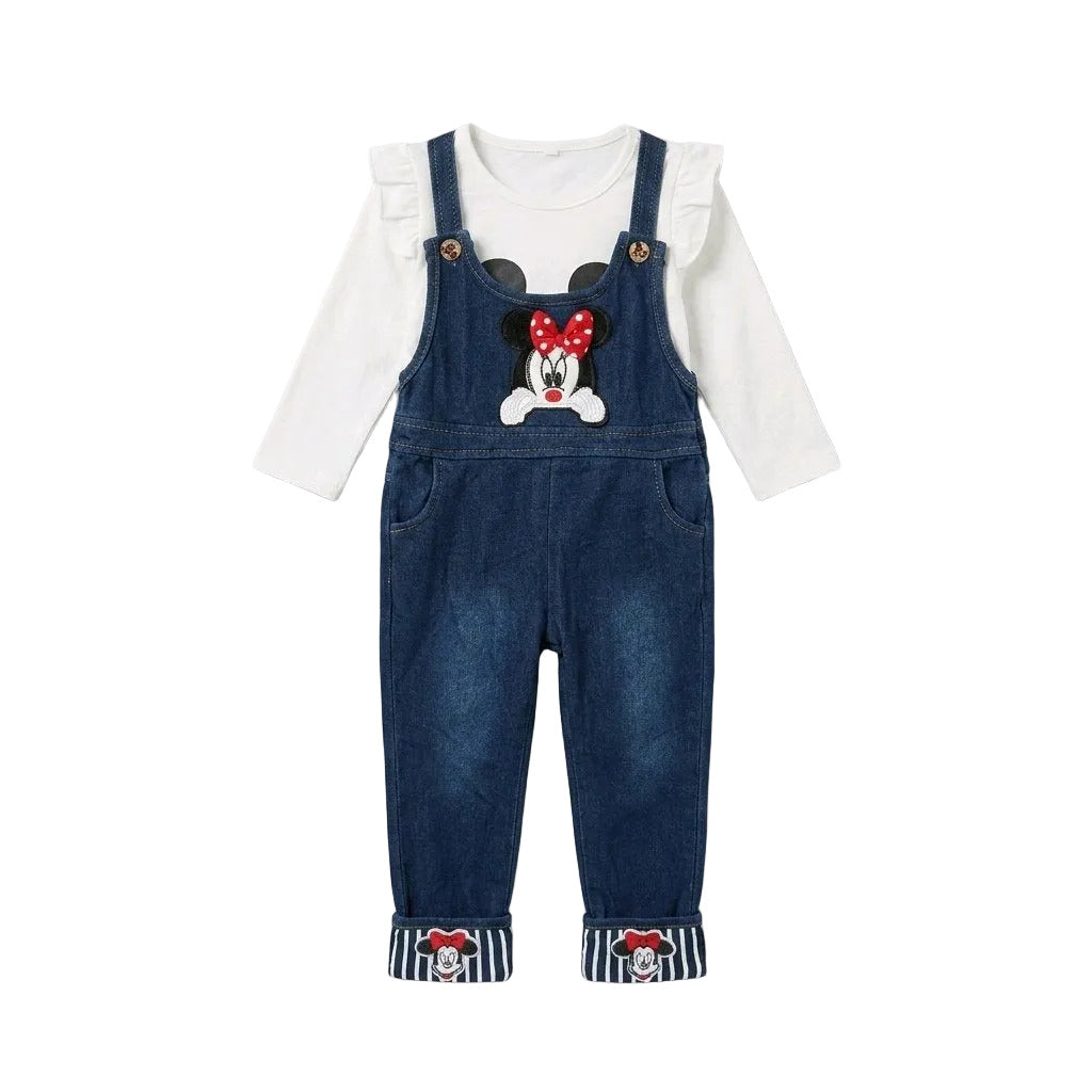 A baby girl's denim overall romper set featuring a white long-sleeve ruffle shirt underneath and a Minnie Mouse face applique on the chest, with striped and patterned foot cuffs.