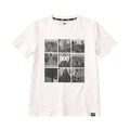White t-shirt with black and white cityscape design and DKNY logo on a white background