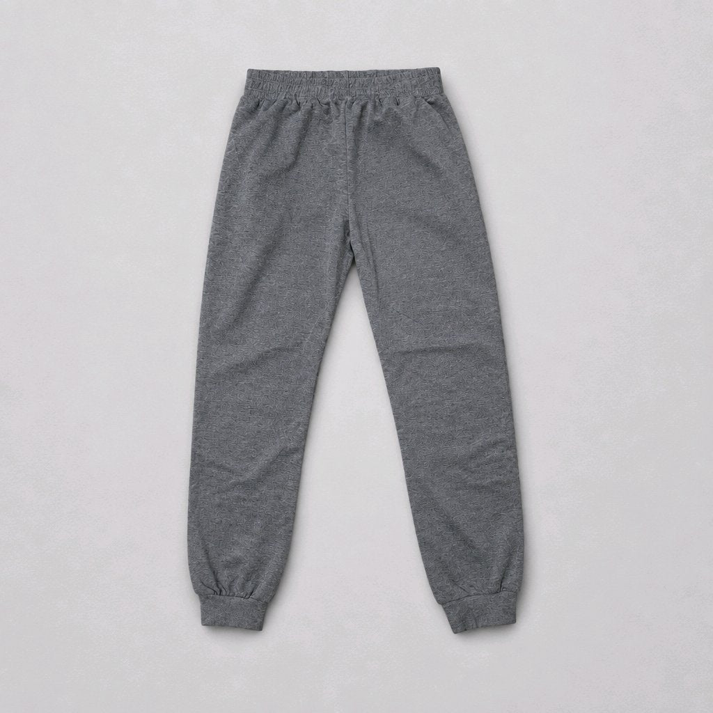A pair of heather gray jogger pants with an elastic waistband and ribbed ankle cuffs, laid flat against a light gray background.
