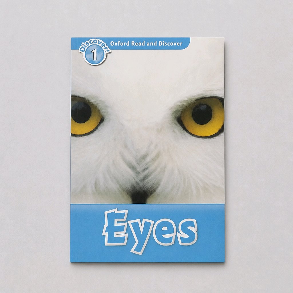 A children's book titled 'Eyes' from the 'Oxford Read and Discover' series, featuring a close-up photograph of a white owl's eyes on the cover, set against a light gray background.