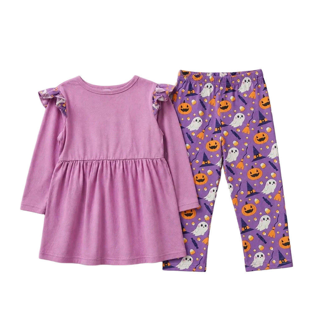 Purple dress and Halloween-themed leggings on a light gray background
