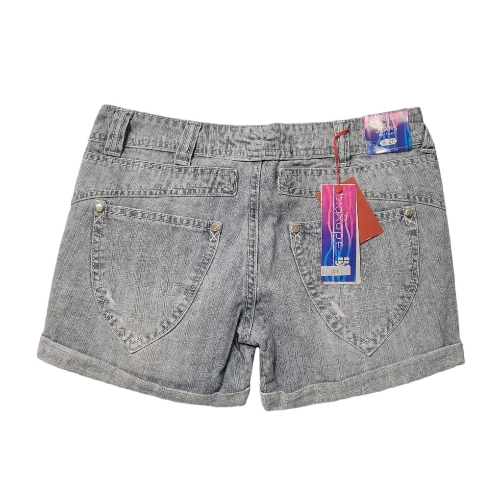 Gray denim shorts with a tag on a light gray background