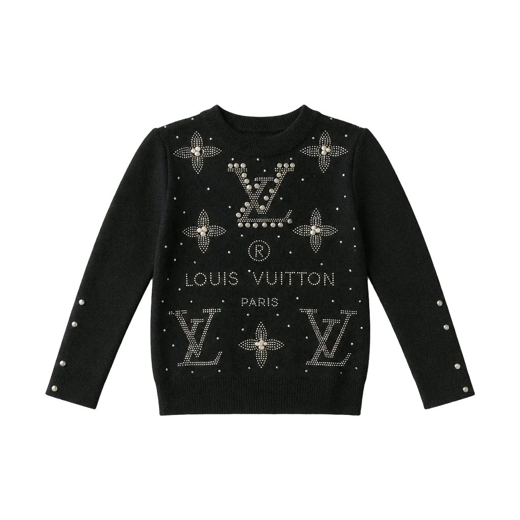 A black Louis Vuitton knit sweater for kids, featuring silver-tone rhinestone monogram logos and text on the front, with rhinestone-embellished sleeves and collar, shown flat on a light gray background.