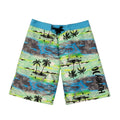 Colorful beach shorts with tropical island design on a gray background