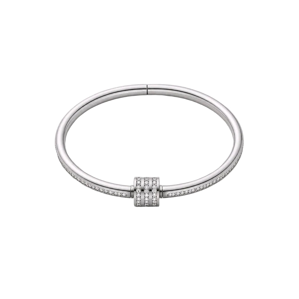 Silver bracelet with a clasp on a light gray background