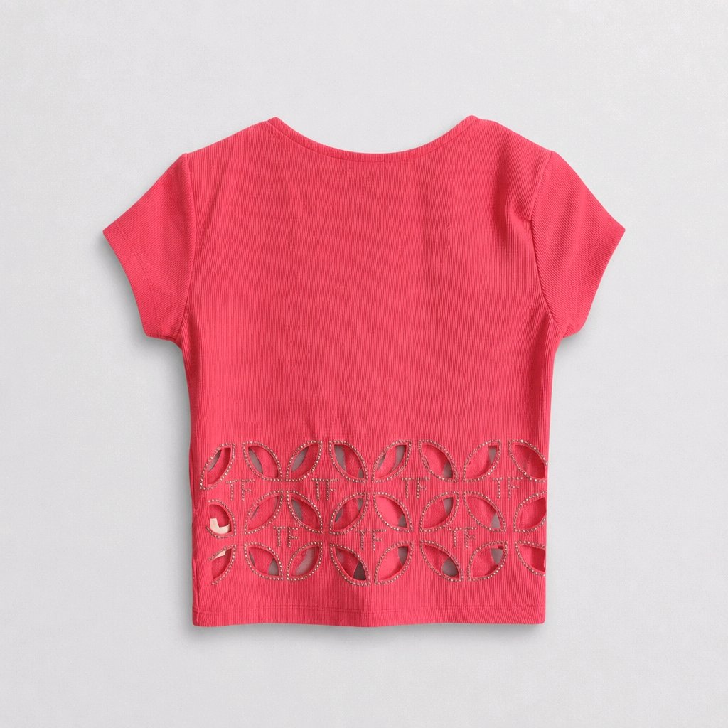 Red t-shirt with cut-out design on a gray background