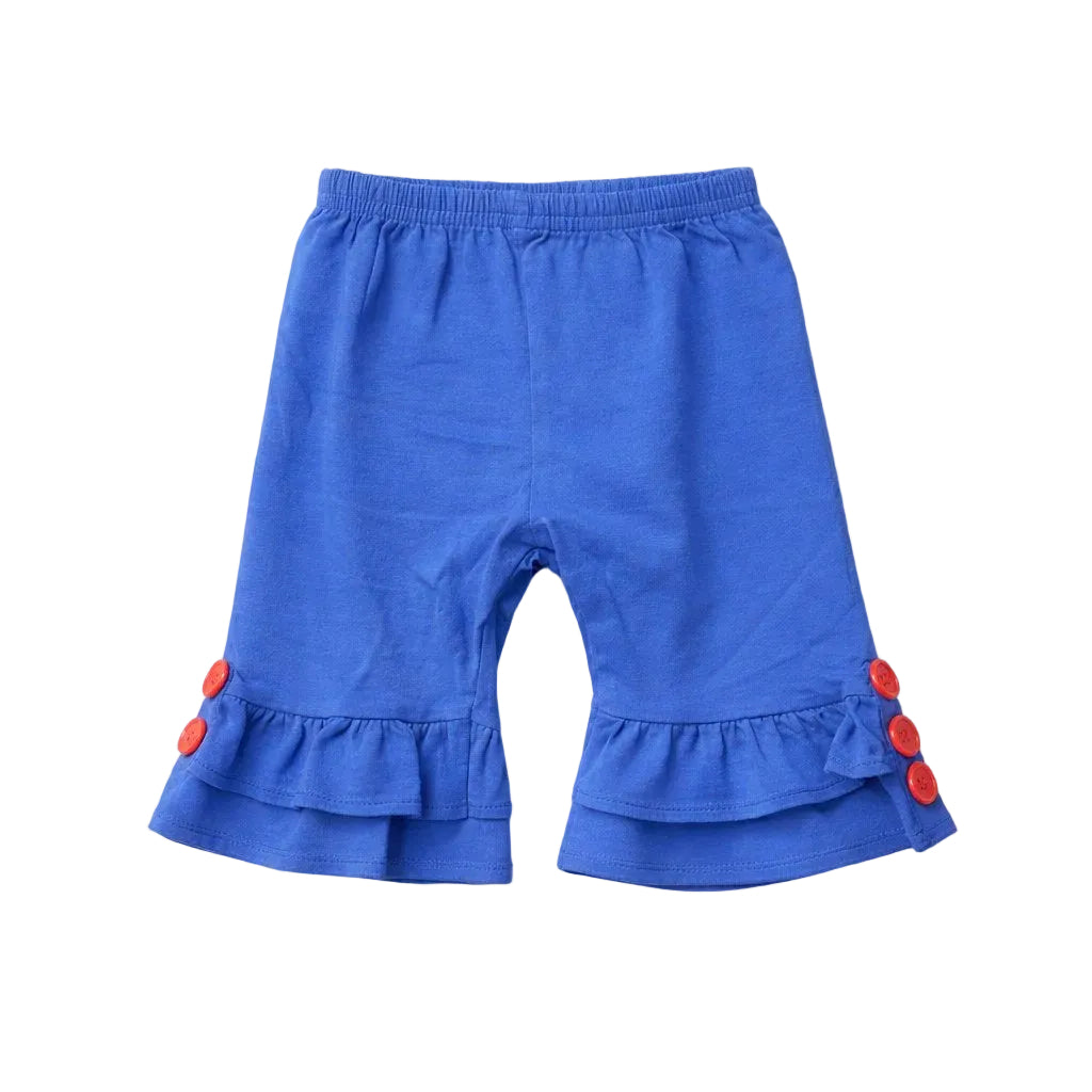 Blue children's pants with ruffles and red buttons on a white background