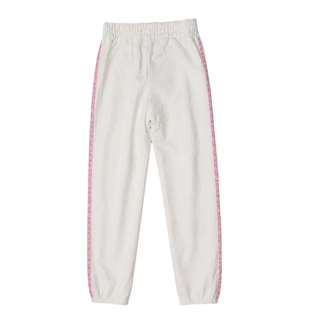 White face mask with pink trim on a gray background