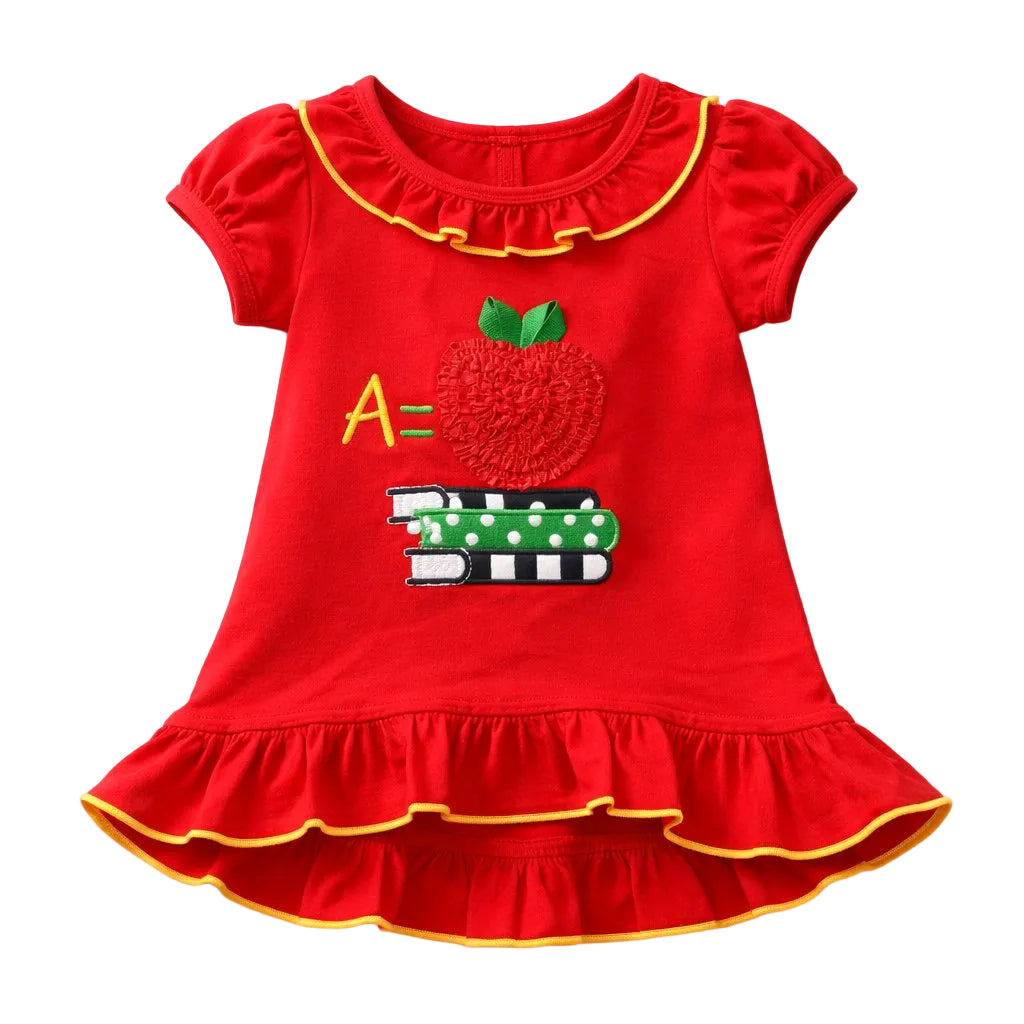 Red dress with apple and book design on a white background