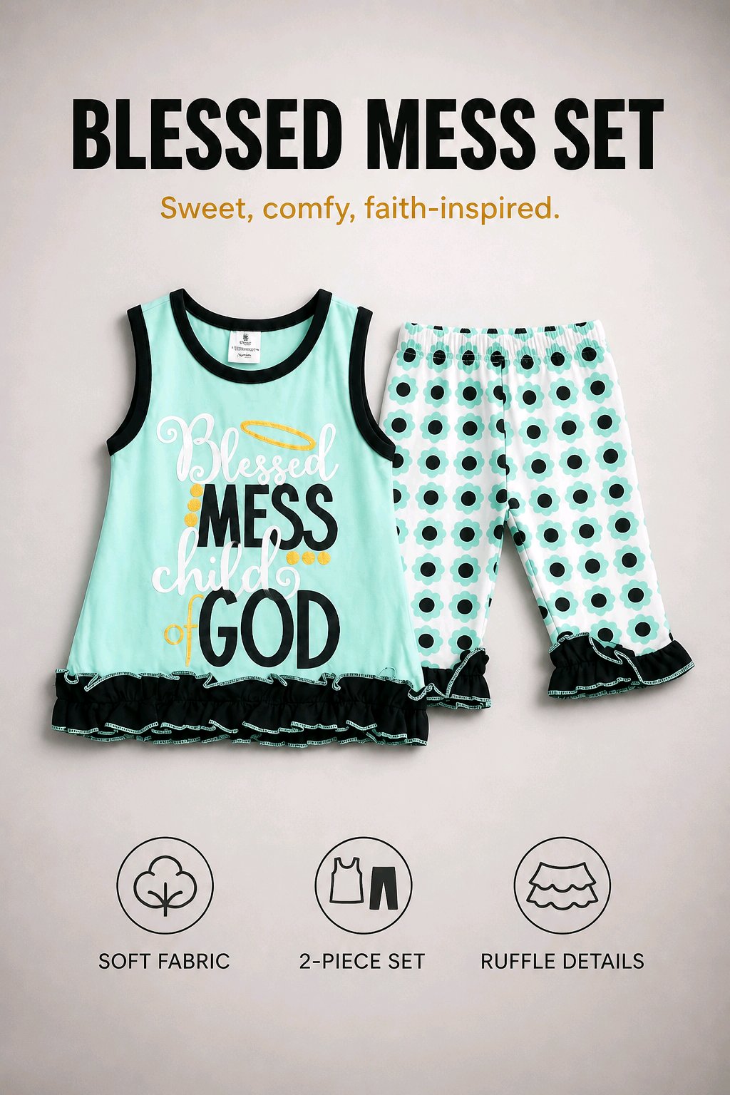 A two-piece baby girl's sleepwear set labeled 'BLESSED MESS SET' on a light beige background. The set includes a light aqua sleeveless tank top with black trim, black and gold text reading 'Blessed Mess God', and black ruffle trim at the hem, paired with matching light aqua pants with black polka dots and black ruffle hems.