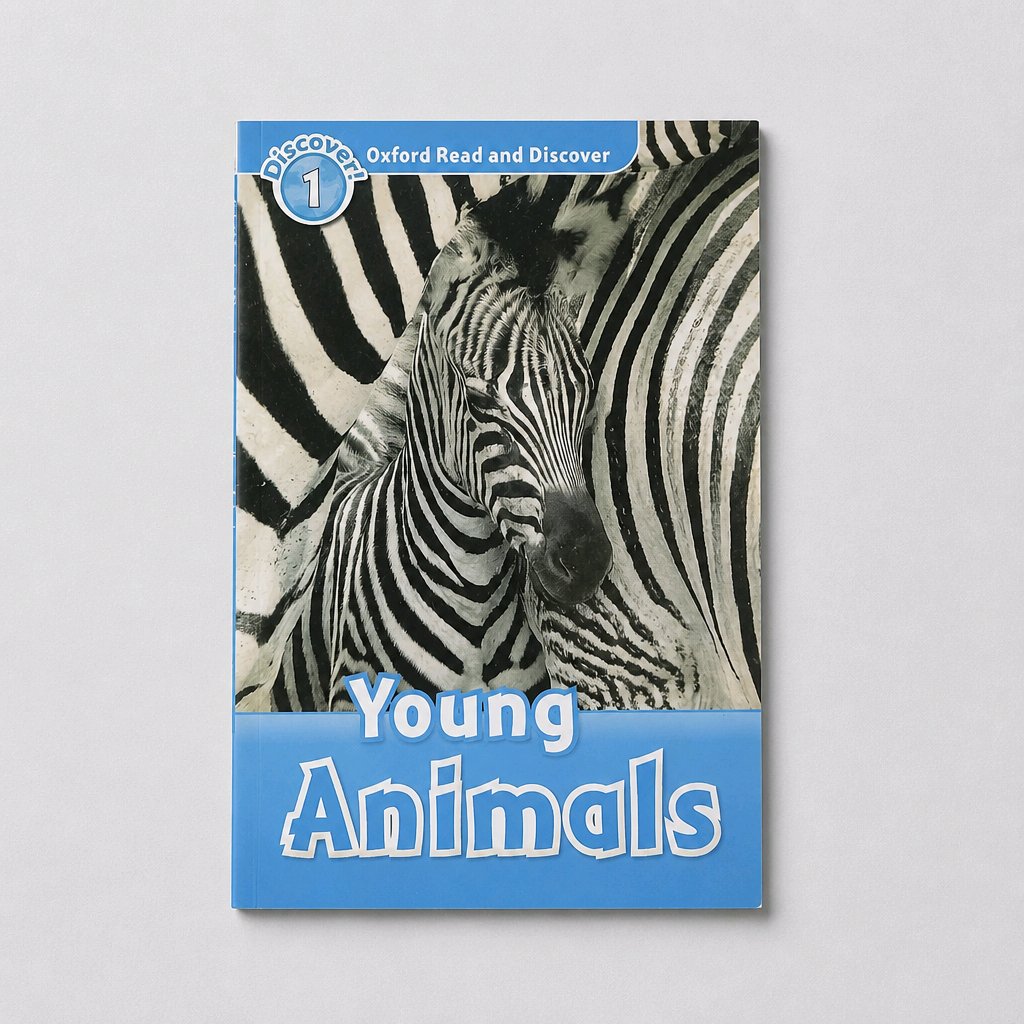 A children's book titled 'Young Animals' from the 'Oxford Read and Discover' series, featuring a cover illustration of zebras with a blue title banner at the bottom, shown on a light gray background.
