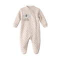 Baby onesie with polka dot pattern and 'adorable' text on a white background