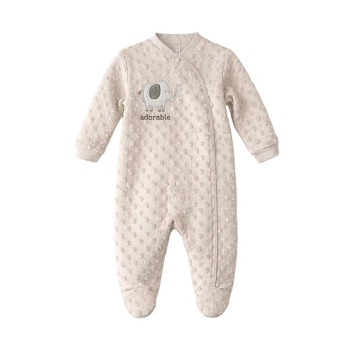 Baby onesie with polka dot pattern and 'adorable' text on a white background