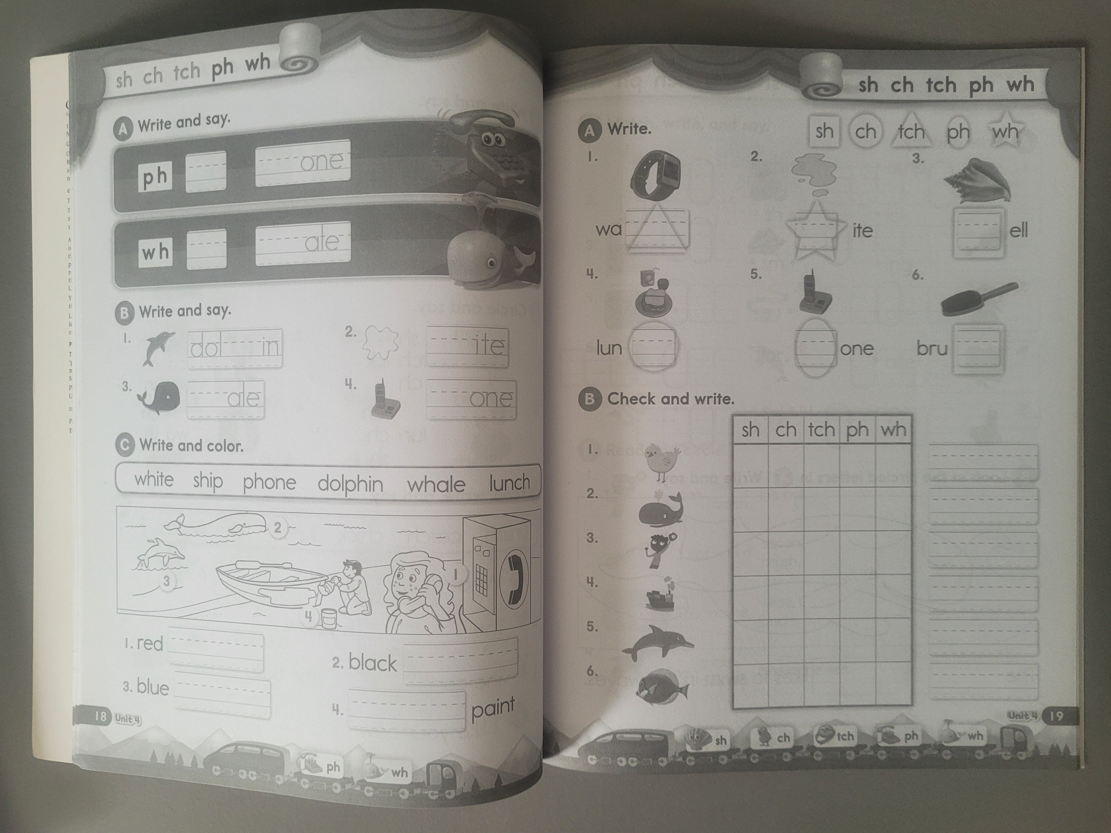 Open book with educational content on phonics and vocabulary, featuring text and illustrations.