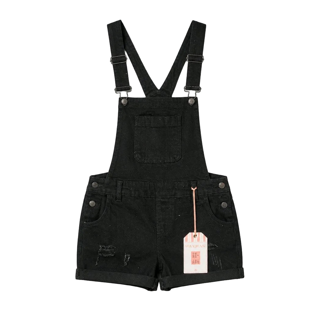 Black denim overalls with a tag on a gray background