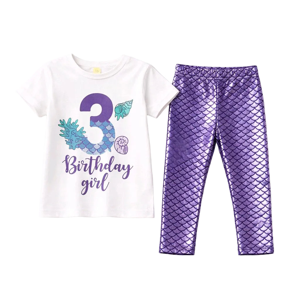 White t-shirt with '3rd Birthday girl' text and purple sequin leggings on a white background