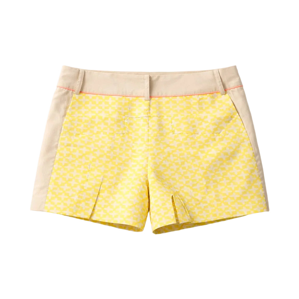 Yellow shorts with beige accents on a light gray background