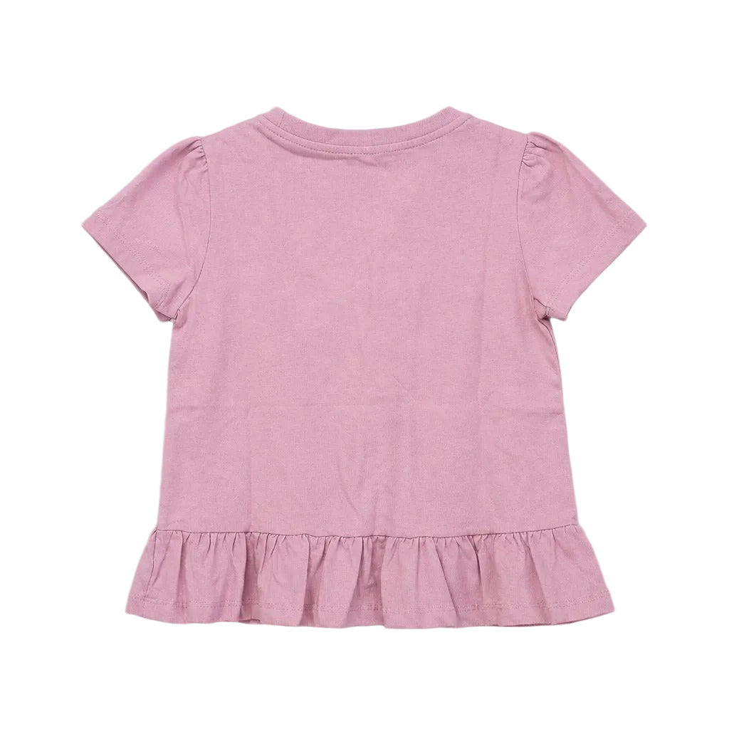 Pink ruffled dress on a light gray background