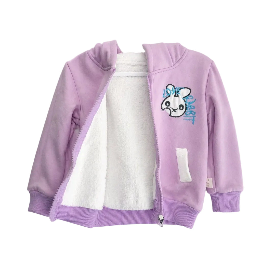 A children's light purple zip-up fleece jacket with a white sherpa lining, featuring a cartoon bunny graphic on the chest with blue text.