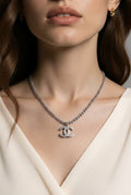 Chanel Silver Tone Logo Necklace
