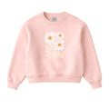 Pink sweatshirt with floral design on a light gray background