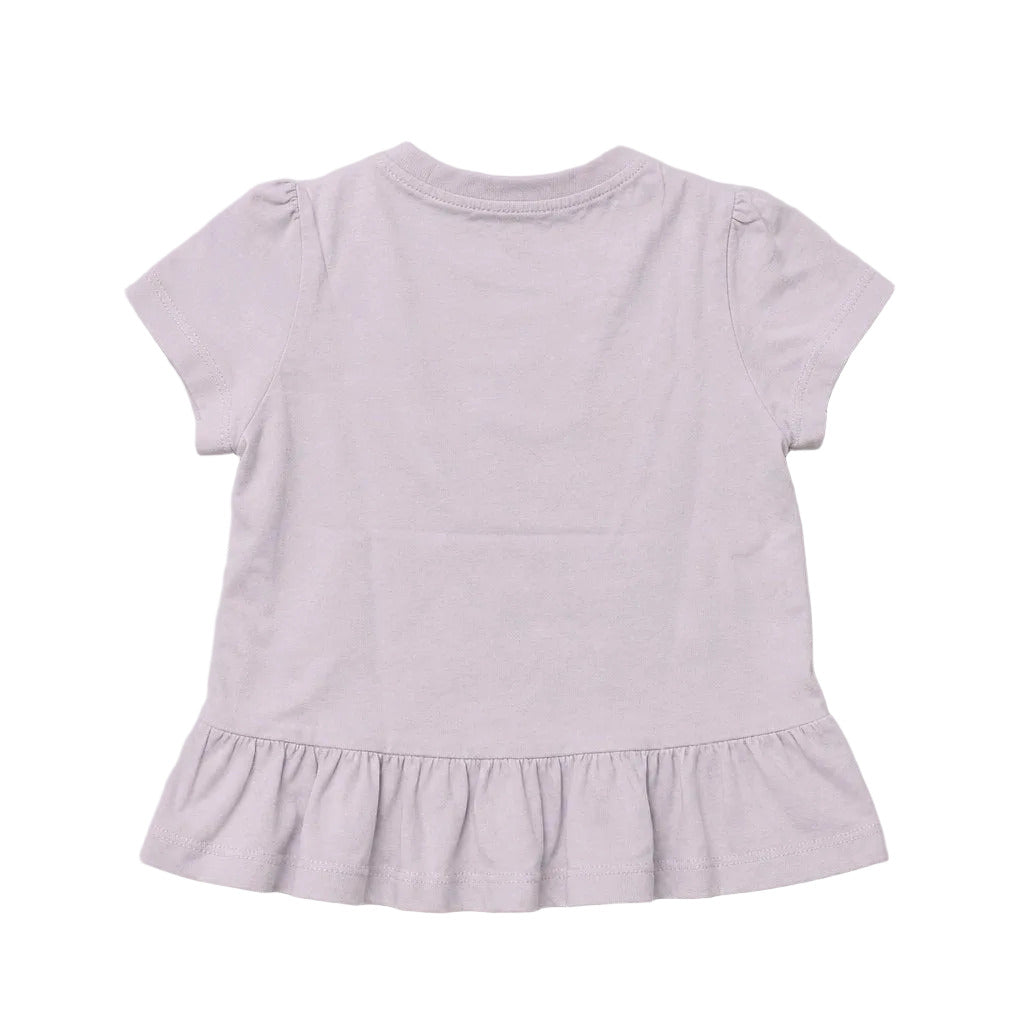 Lavender ruffled dress on a light gray background