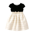 Black and white dress with a bow on a white background