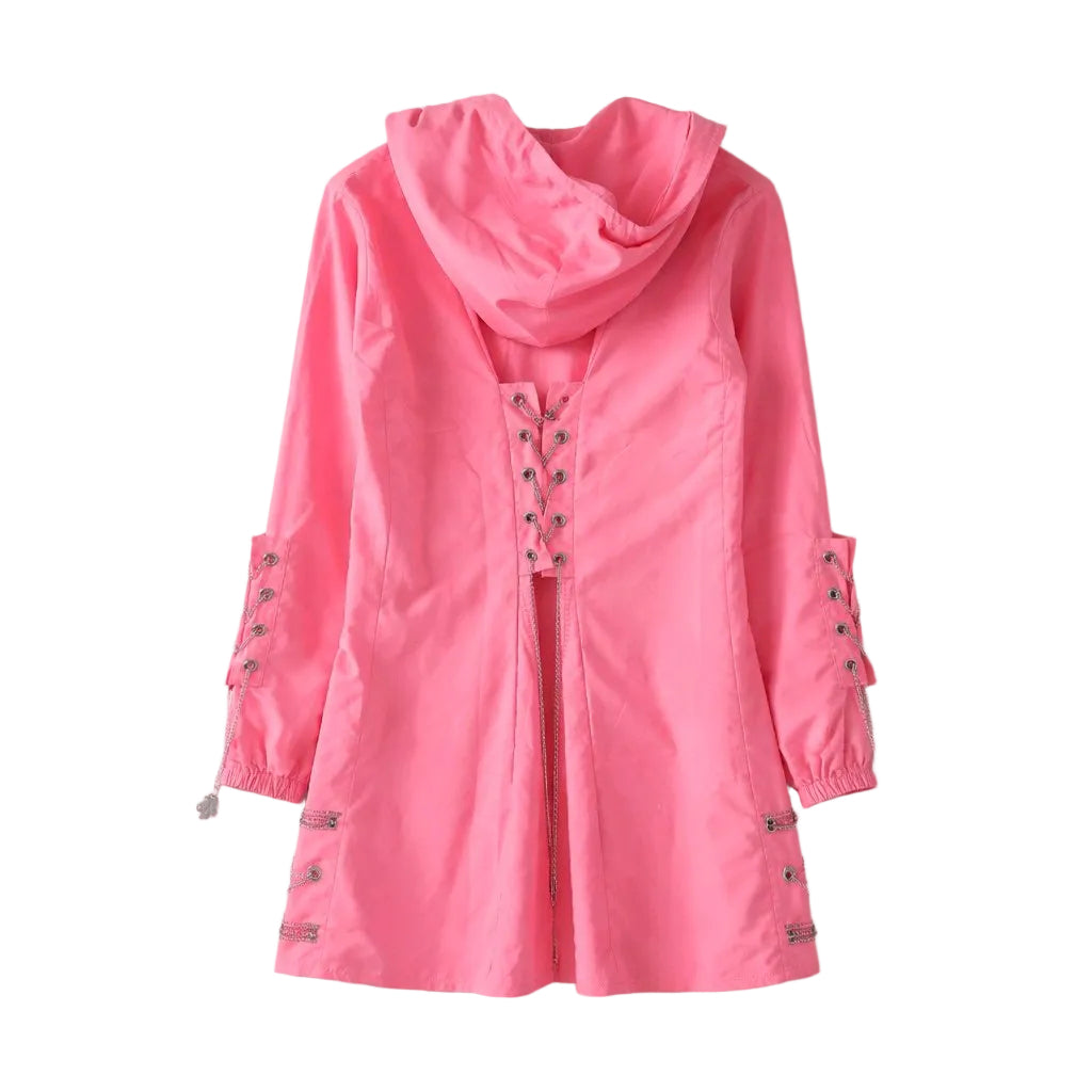Pink raincoat with button details on a light gray background